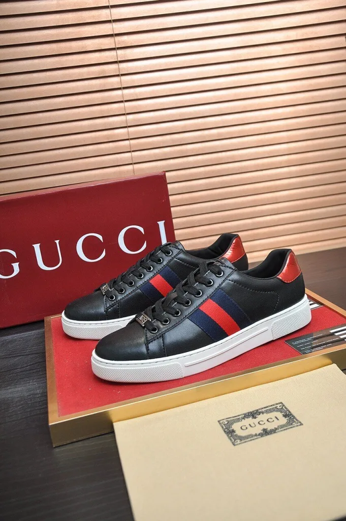 Gucci Low Top Sneakers in Black Leather Featuring Red and Blue Stripes