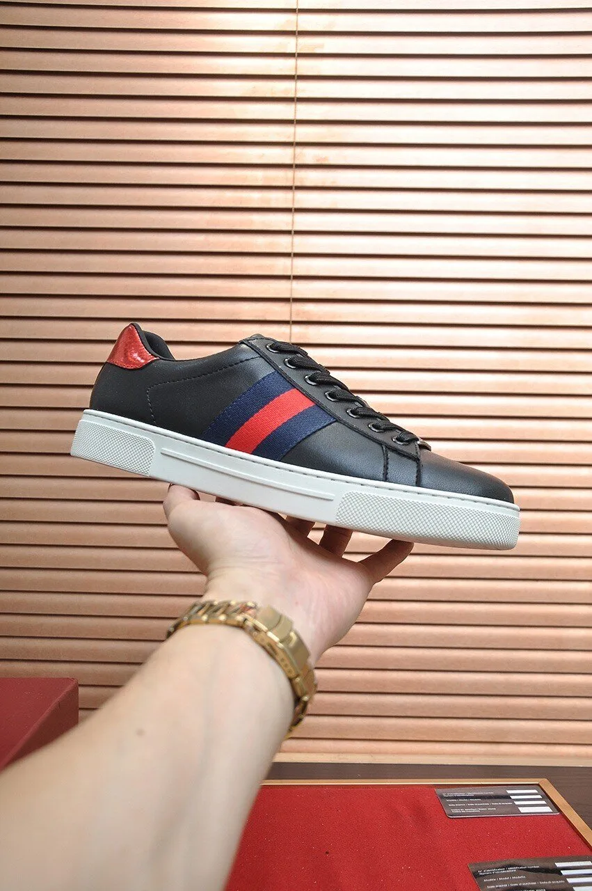 Gucci Low Top Sneakers in Black Leather Featuring Red and Blue Stripes